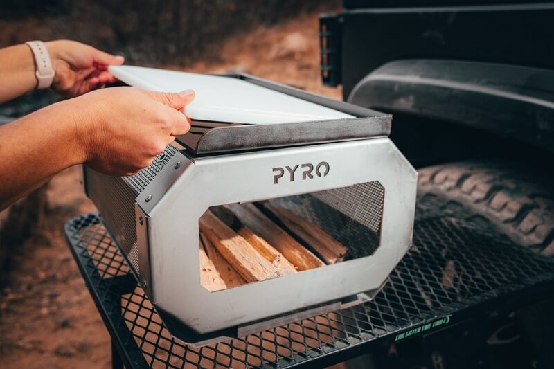 Pyro Camp Fire Pit Lets You Grill Foods with Wood or Charcoal and Converts Into a Fire Pit